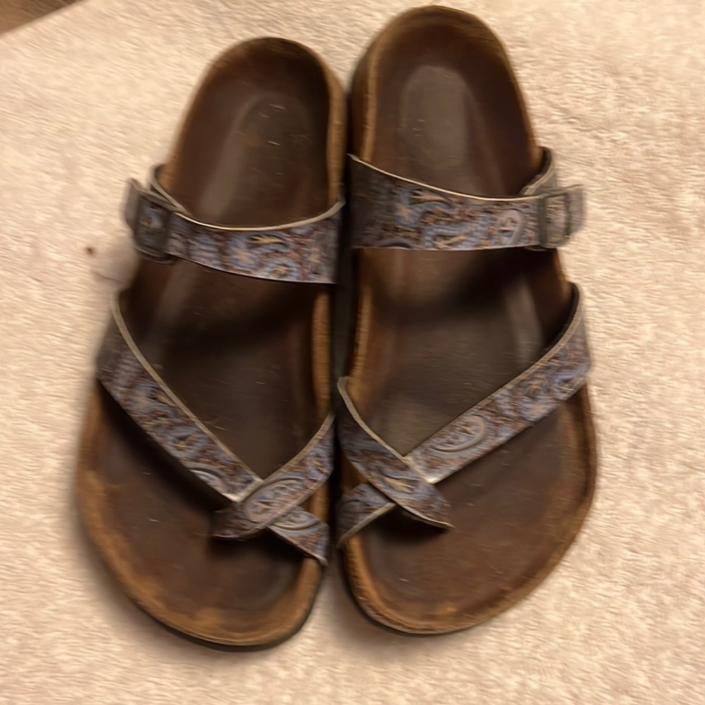 Birkenstock sandals great with denim paisley print. Used condition.
